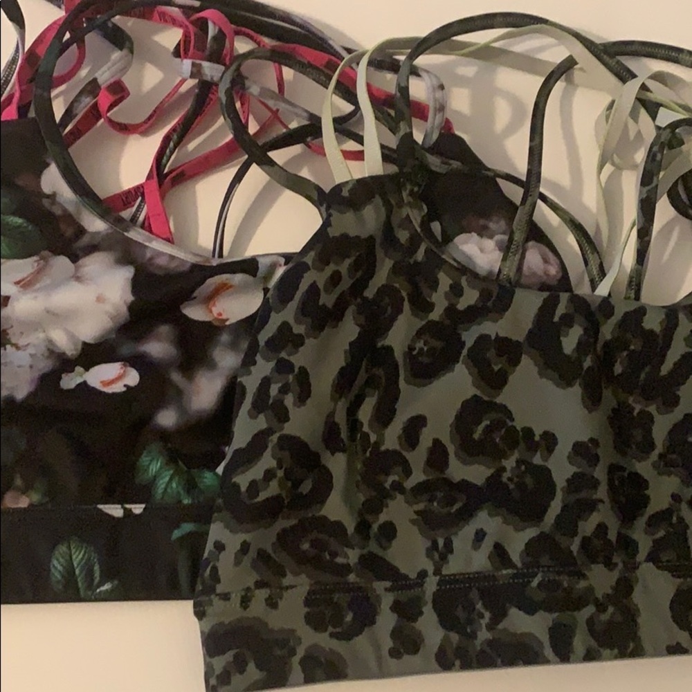 TWO Victoria’s Secret strappy sports bras